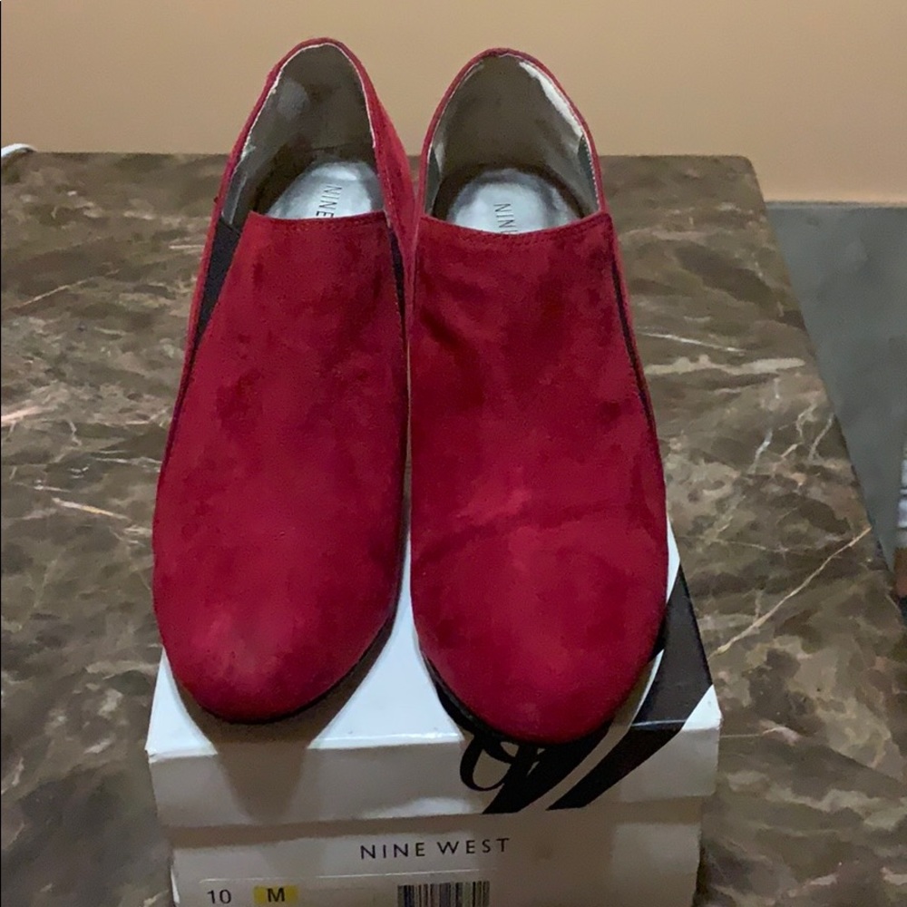 Red w/black trim suede 3 1/2 heels.